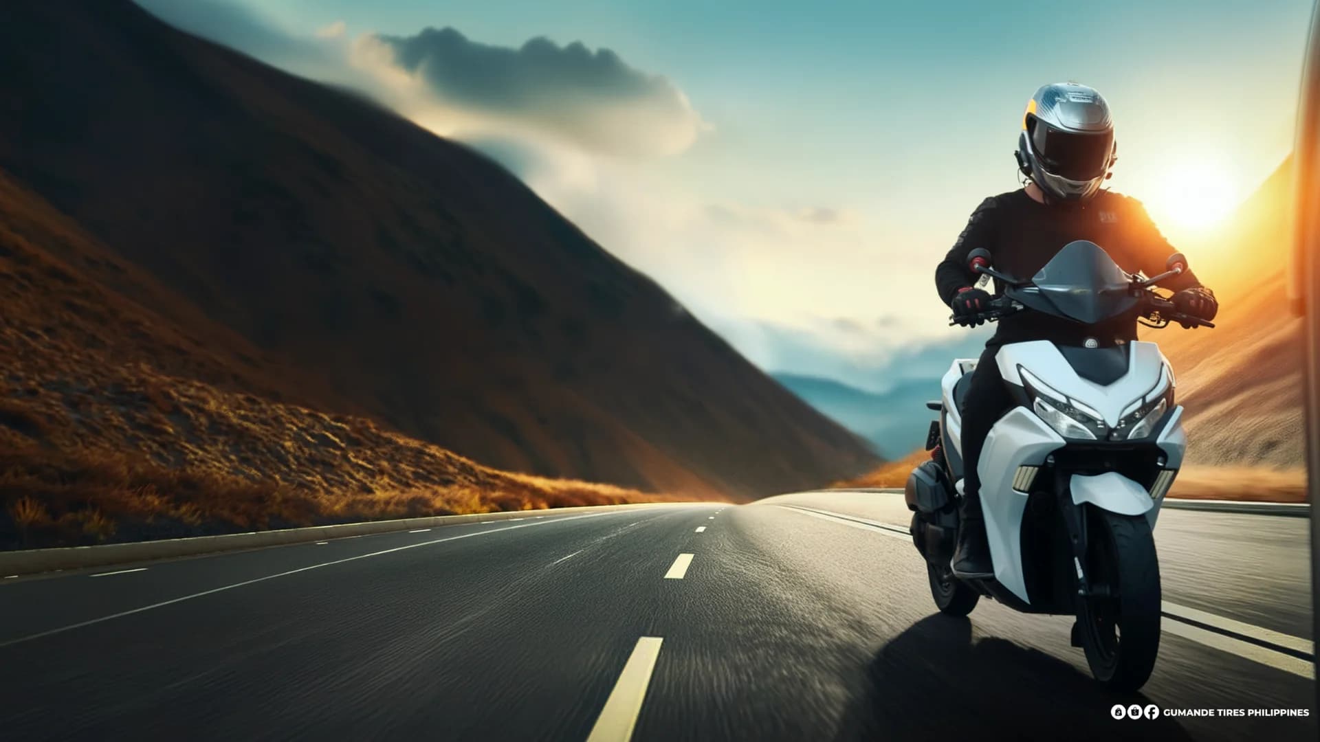 Rider on a mountain road at sunset on Gumande tires